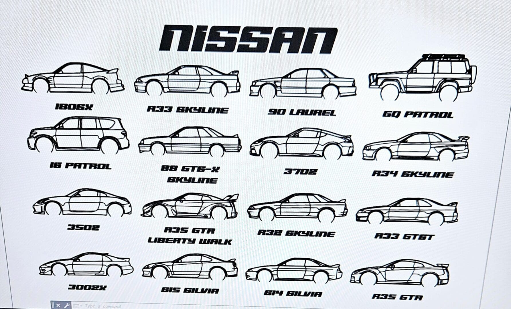 A drawing of different types of cars on paper